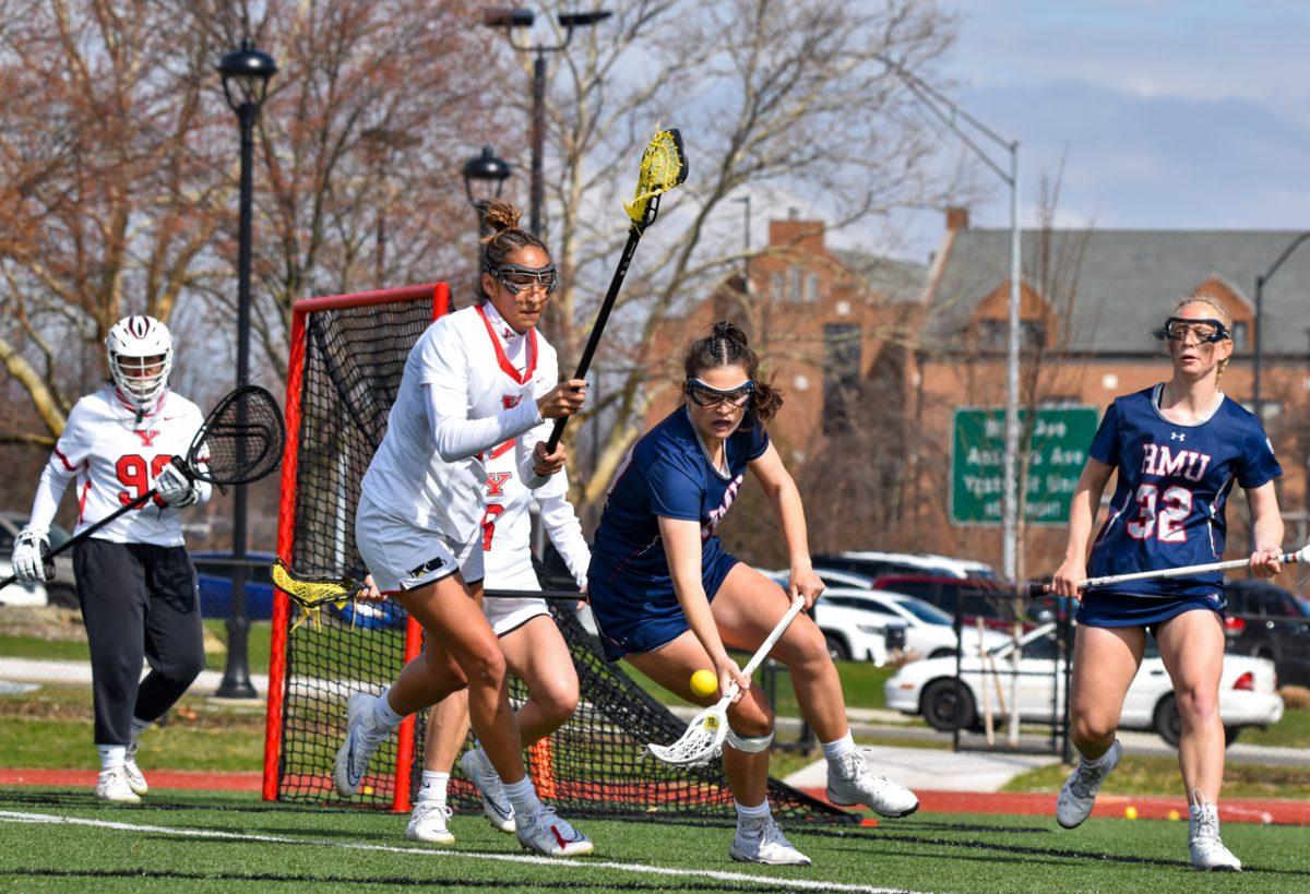 Jerica Obee goes for a ground ball during the game against YSU. Photo Credit: Megan Frey