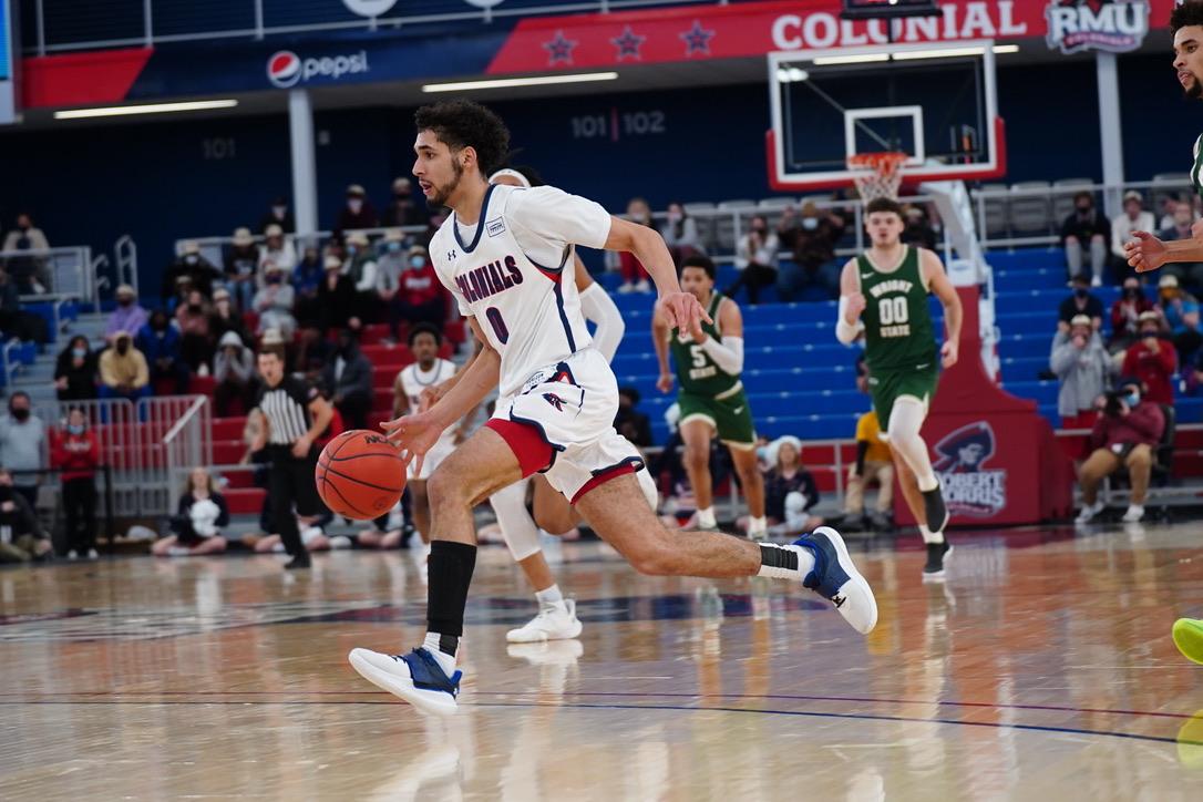 Kam Farris drives to the hoop against Wright State. Photo Credit: Justin Newton