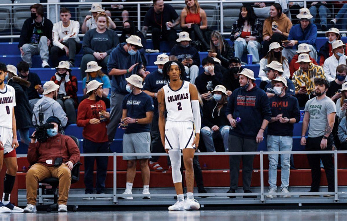 Kahliel Spear stands in front of the student section waiting for an inbound pass against Wright State. Photo credit: Justin Newton