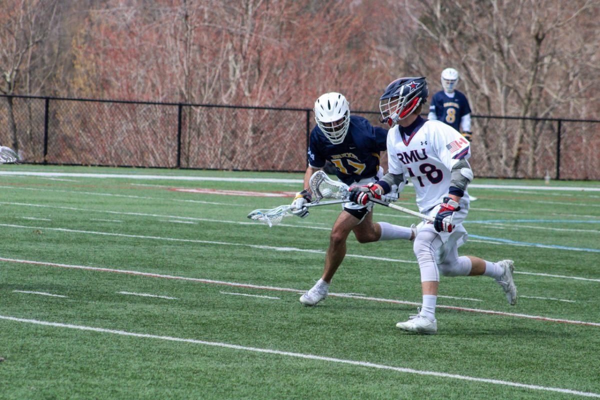 Colton Lidstone rushes downfield against Drexel. Photo credit: Cameron Macariola