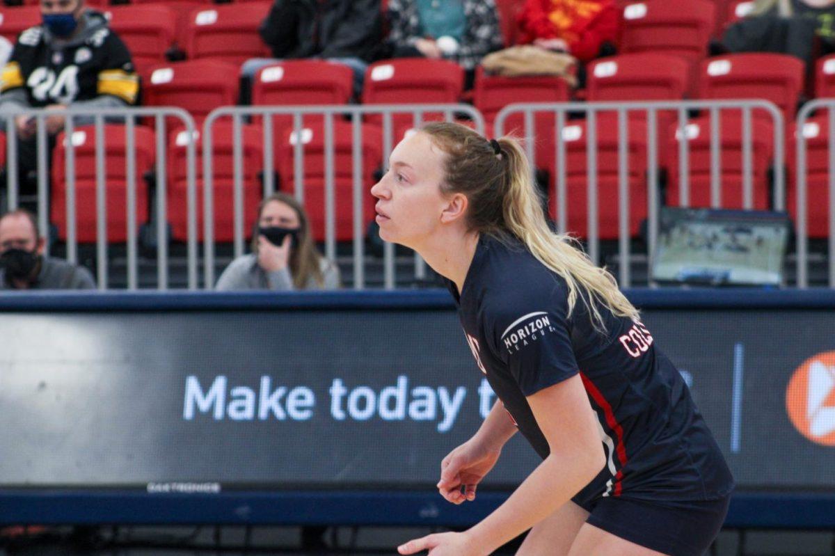 Alyson Londot readies for a serve against Green Bay. Photo credit: Tyler Gallo