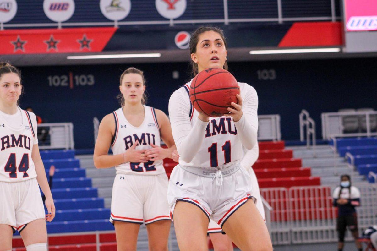 Natalie Villaflor attempts a free-throw against UIC. Photo credit: Tyler Gallo