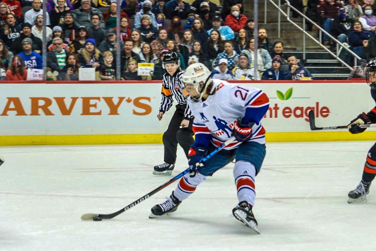 Hillary Knight scores Team USAs first goal of the afternoon on a backhanded shot to beat Ann-Renee Desbiens. Photo credit: Ethan Morrison