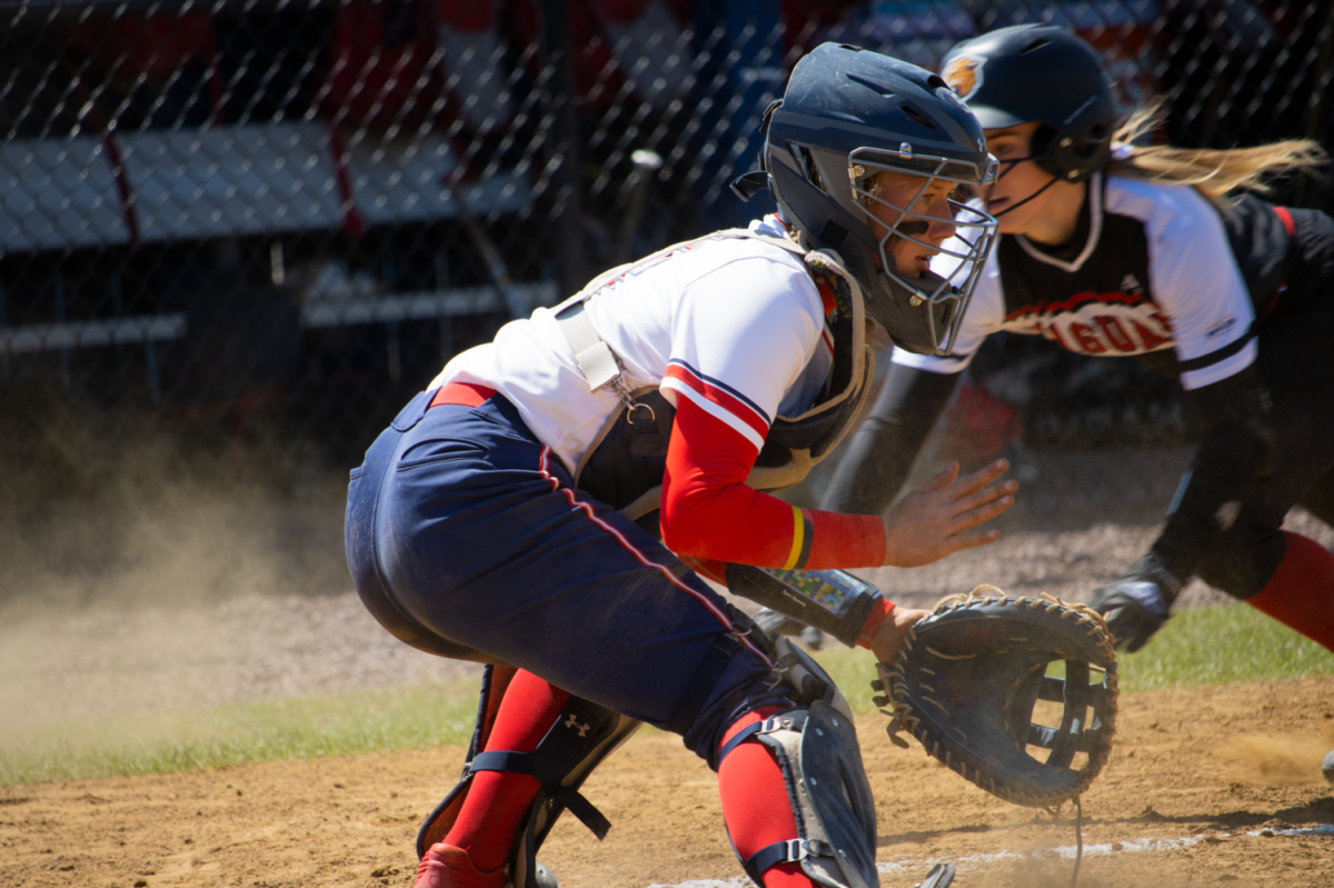 Catcher+Meadow+Sacadura+makes+a+play+at+the+plate+against+IUPUI.+Photo+credit%3A+Ethan+Morrison