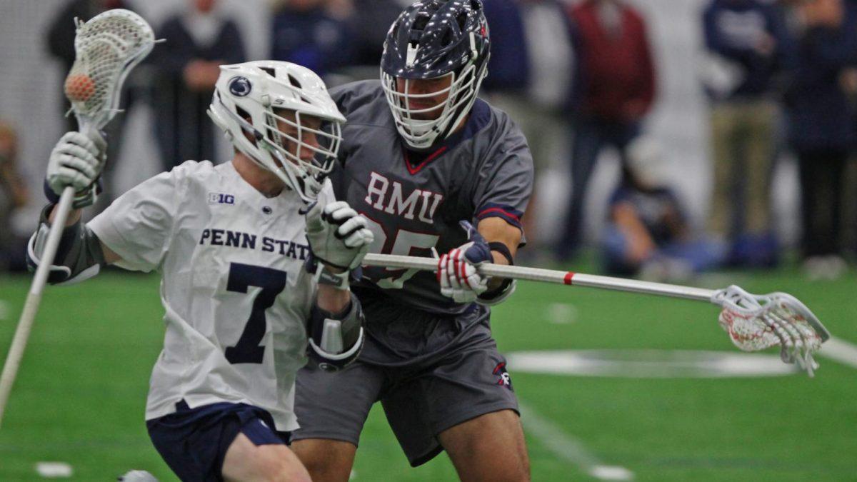 Owen Down attacks a Penn State player. Photo credit: RMU Athletics