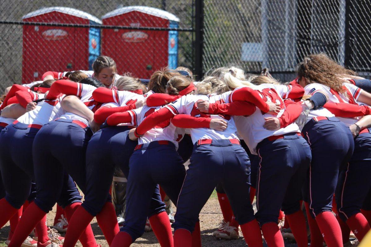 The team huddles before their game against IUPUI on April 15, 2022 Photo credit: Ethan Morrison