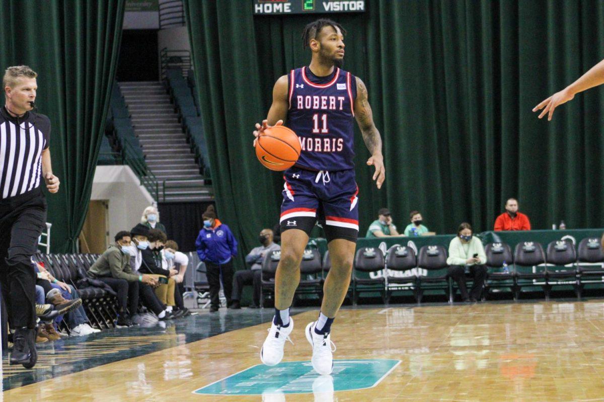 Jaron Williams dribbles up the court in a game at Cleveland State on January 23, 2022