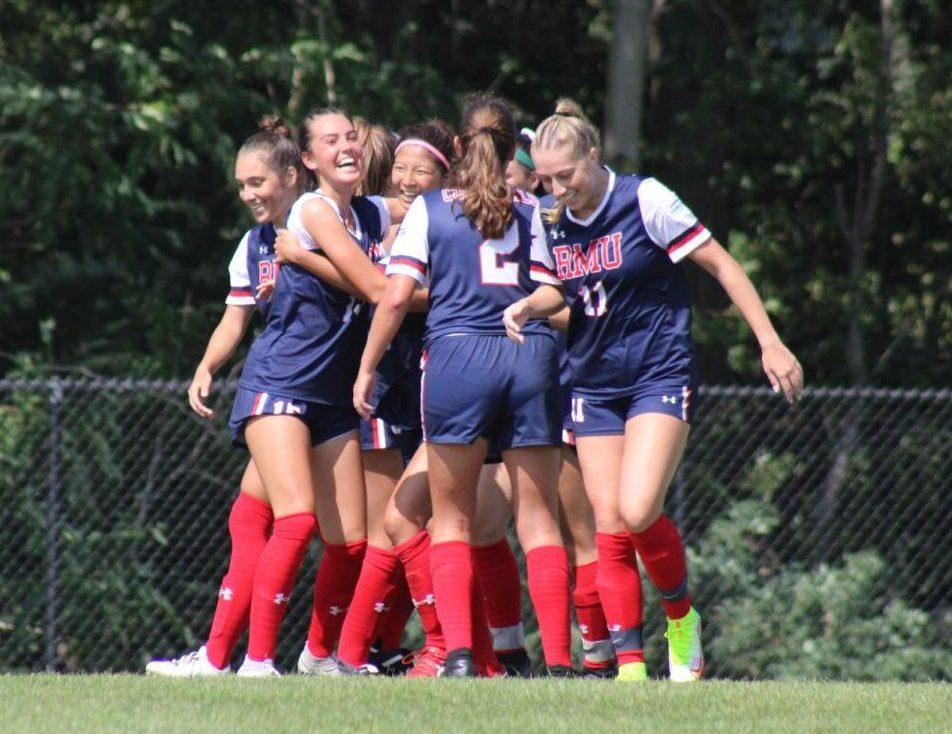 The team celebrates a goal during a game against Valparaiso on August 29, 2021 Photo credit: Samantha Dutch