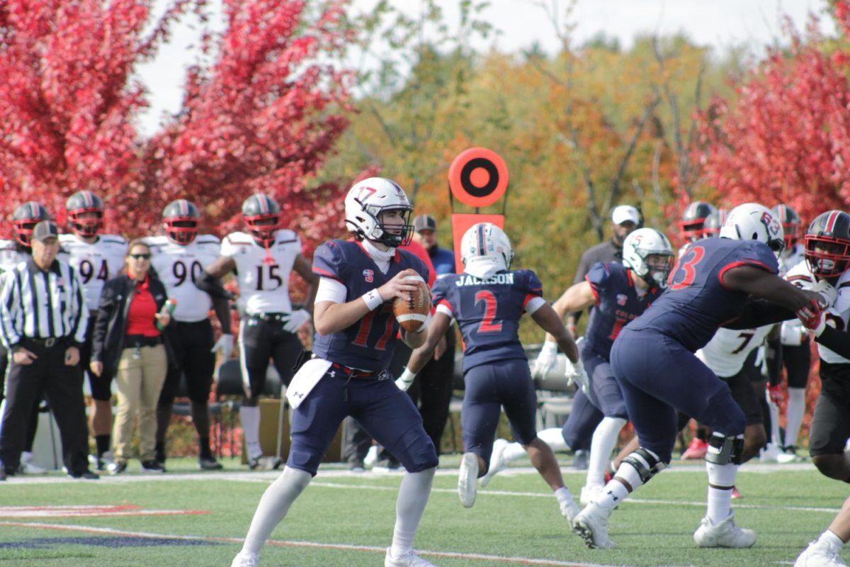 Freshman Zach Tanner steps back for a pass Photo credit: Malena Kaniuff