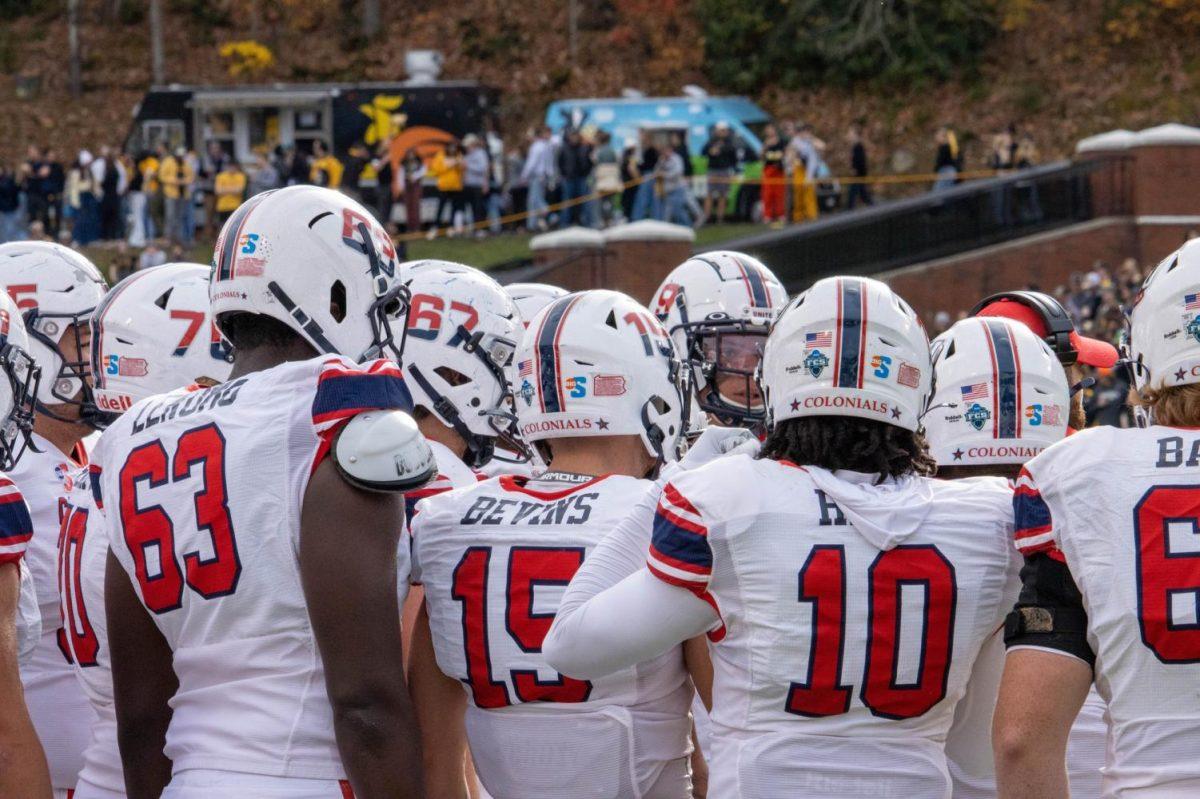 The huddles before their game against Appalachian State Photo credit: Ethan Morrison