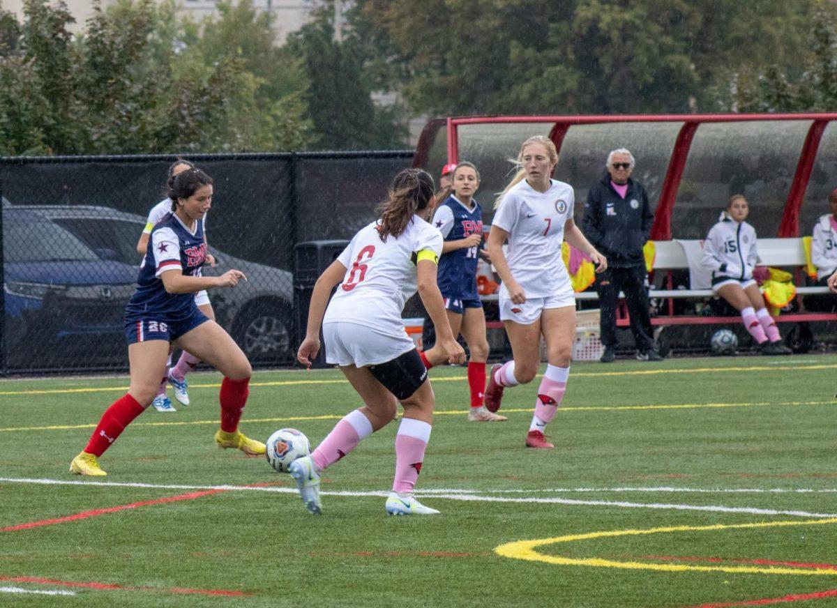 Renae Mohrbacher carries the ball through the defense in Robert Morris 2-0 win over La Roche on Tuesday. Photo credit: Nathan Breisinger