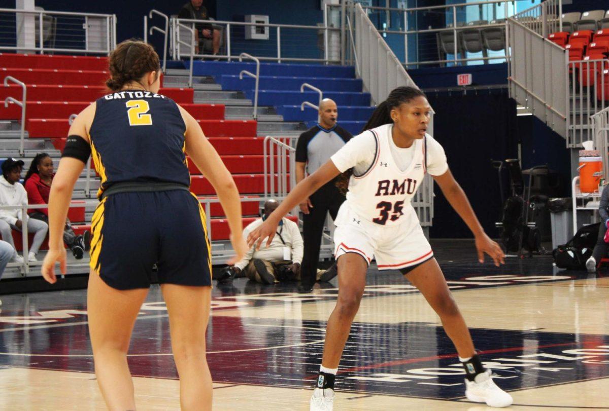 Simone Morris (35) guards Lydia Gattozzi in the 62-52 win over Canisius Photo credit: Alec Miller