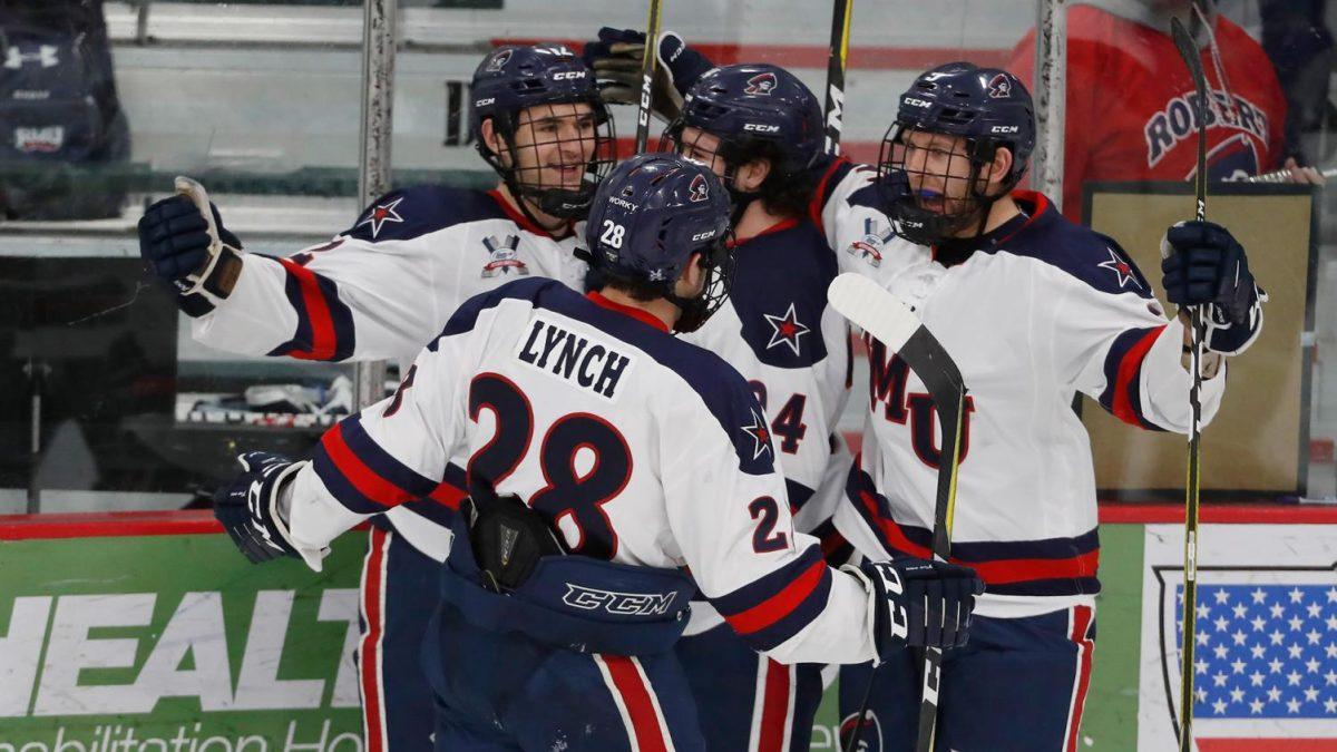 Zac+Lynch+and+Brady+Ferguson+celebrate+a+goal+in+2013.+Photo+credit%3A+RMU+Athletics