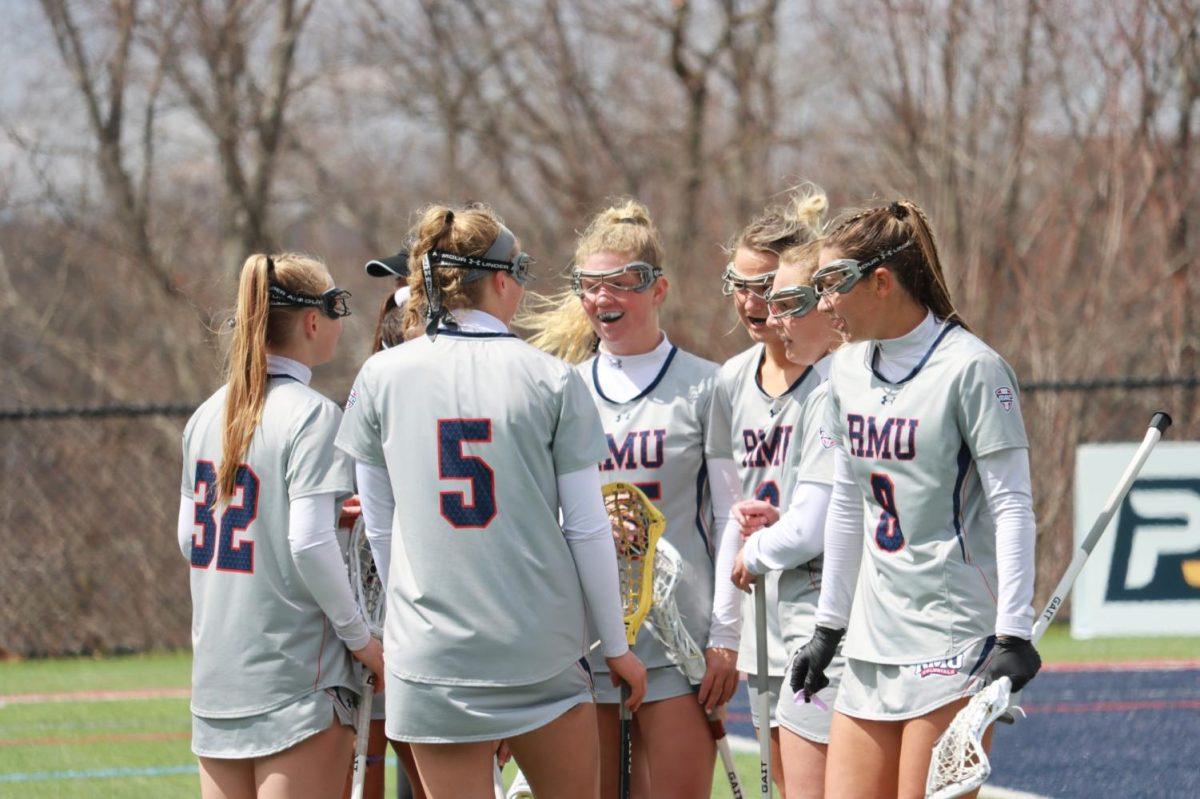 The team celebrates a goal agsinst Kent State on April 9, 2022 Photo credit: Tyler Gallo