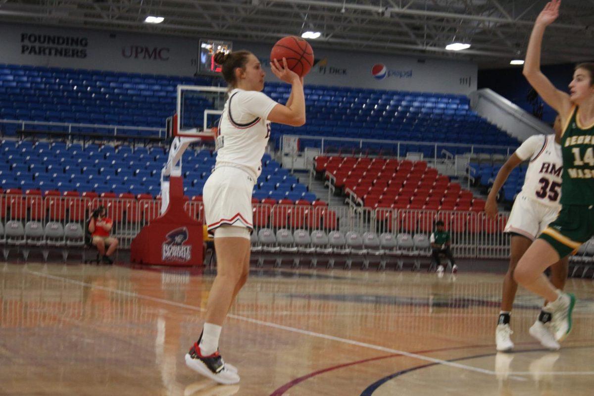 Solis attempts a three-point jumper in the game against George Mason on November 10, 2022