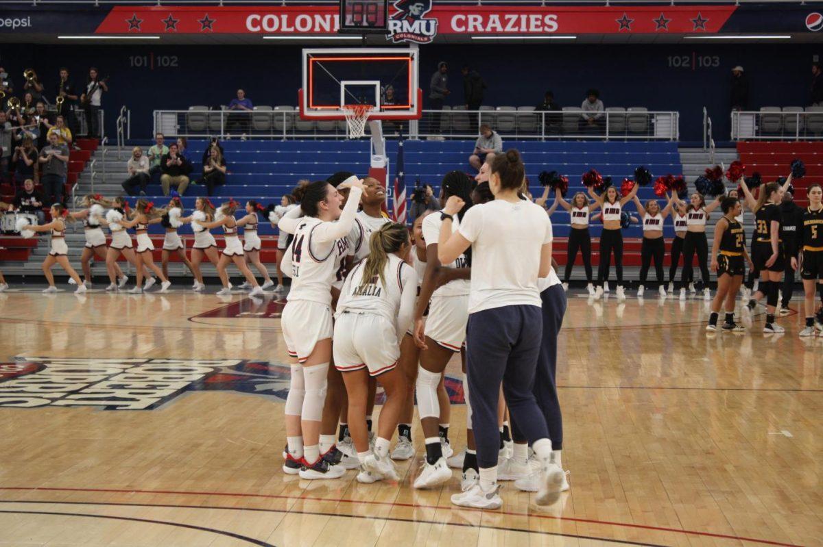 The team celebrates the 50-45 win over Milwaukee Photo credit: Alec Miller