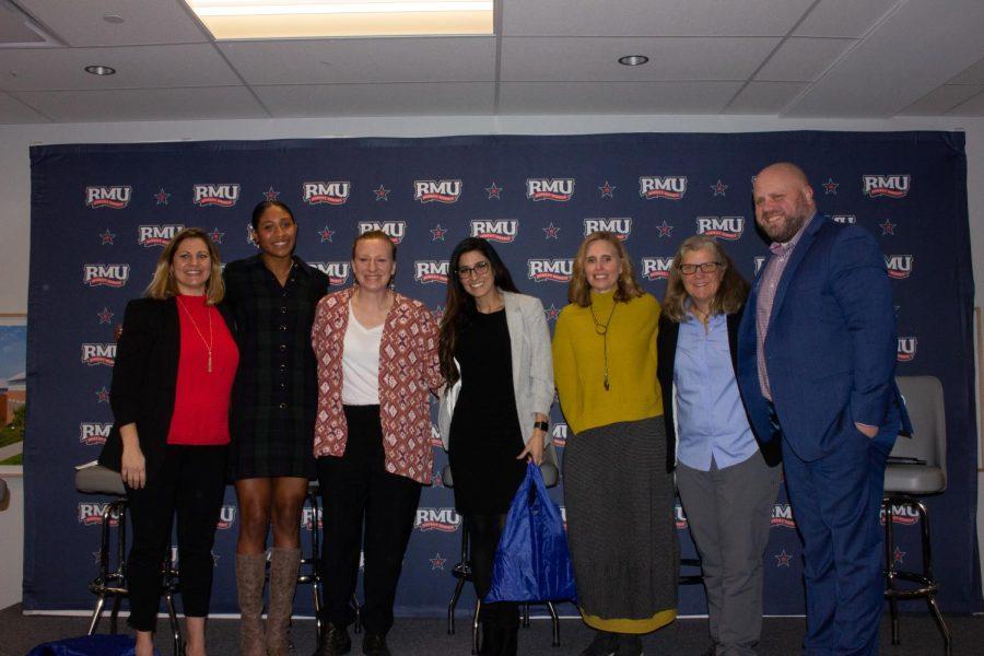 From left, Dr. Sam Monda, Jasmine Thompson,  Dr. Carol Schoenecker, Nayli Russo-Long, Jennifer Johnsen-Nazareth, Coach Katrina Silva, and Coach Danny Doherty pose for a photo. 