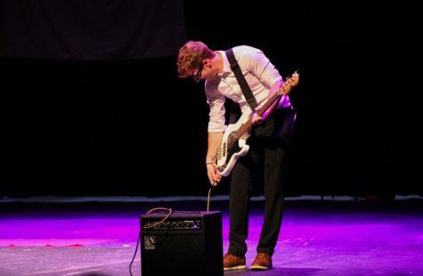 Ben Herman of Phi Delta Theta gets ready for his bass performance.