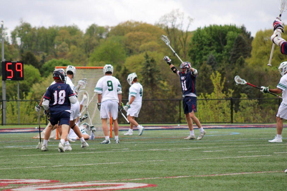 The Colonials celebrate a goal as Robert Morris defeats Jacksonville 9-8 in the ASUN quarterfinals.