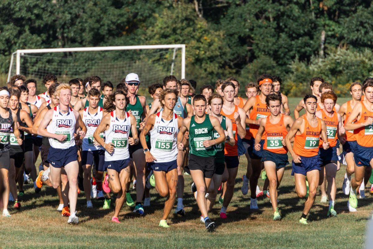 Sophomore Tyler Paszkowski leads his team off the start 