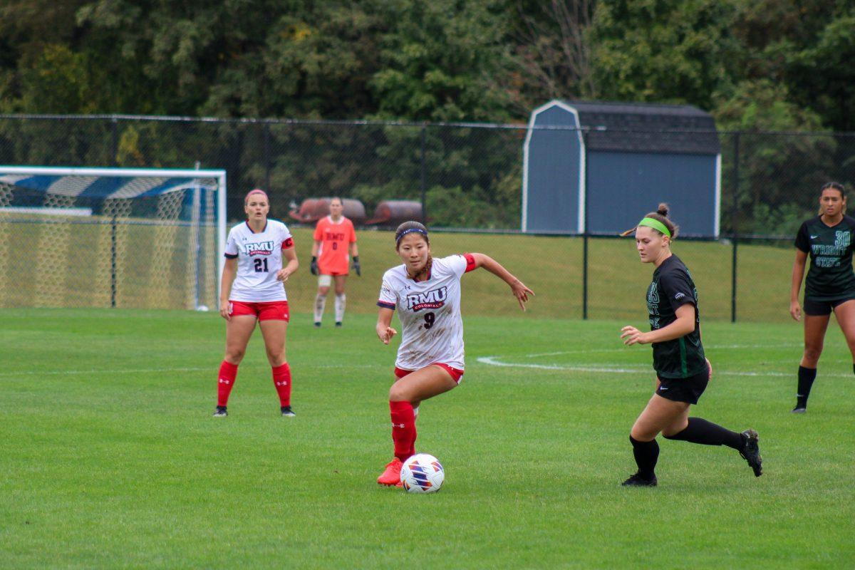 Kaoru Hayashi (9) was honored pregame on Senior Day. The graduate senior has 7 goals and 9 assists in her career as a Colonial. Photo credit: Samantha Dutch