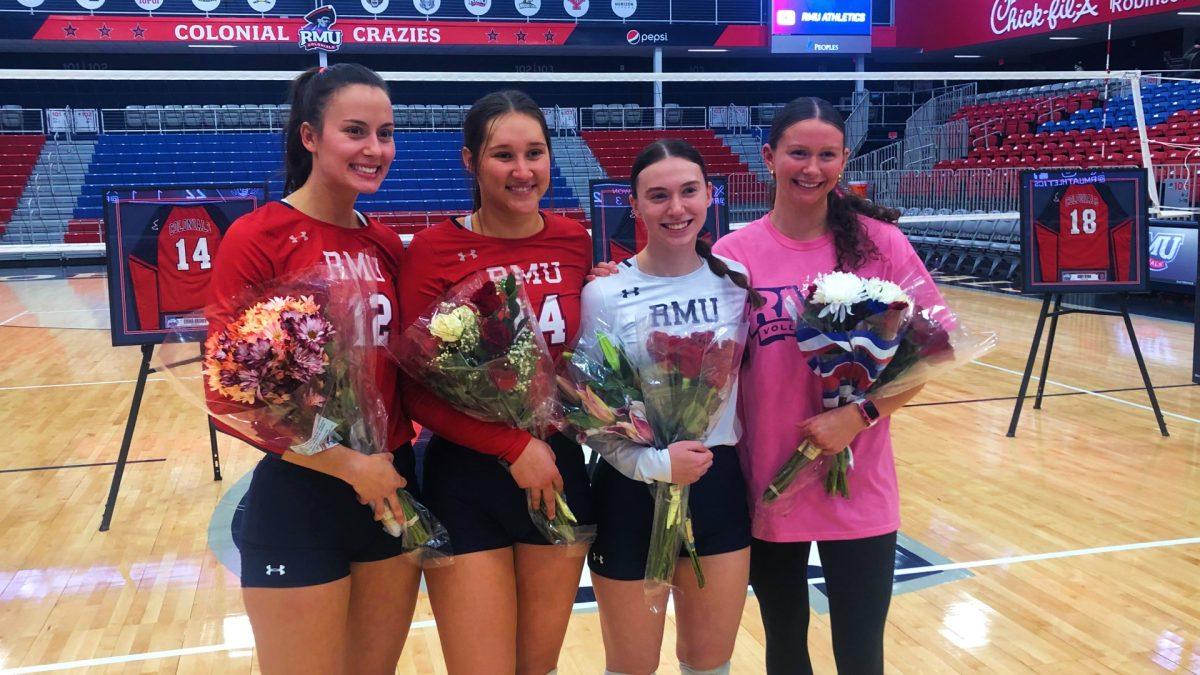 (left to right) Rosina Esposito, Emma Brown, Allena Carmody and Abby Ryan received flowers postgame in their Senior Day celebration Photo credit: Michael Deemer