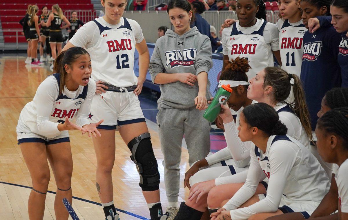 Louella Allana (left) shows her frustration during a timeout Photo credit: Jack Enterline