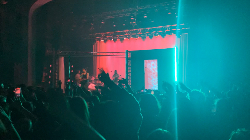 The audience sways their hands as Ricky sings an unreleased song Photo credit: Finn Lyons