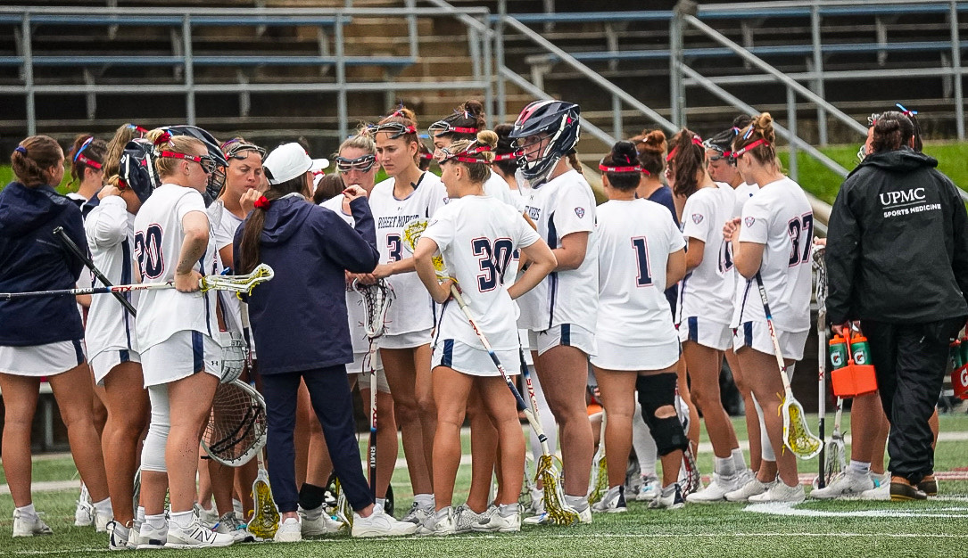 Assistant Coach Emma Simmers talks with her team during a timeout of the 2025 MAC Championship against Akron Photo credit: Joey Jirmasek